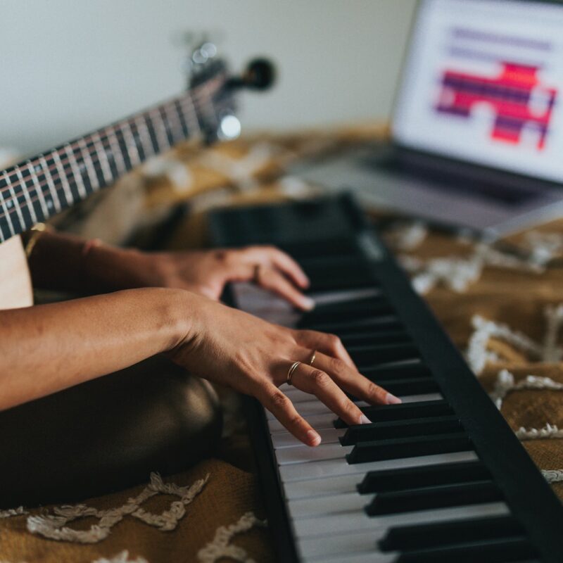 person playing black and white piano
